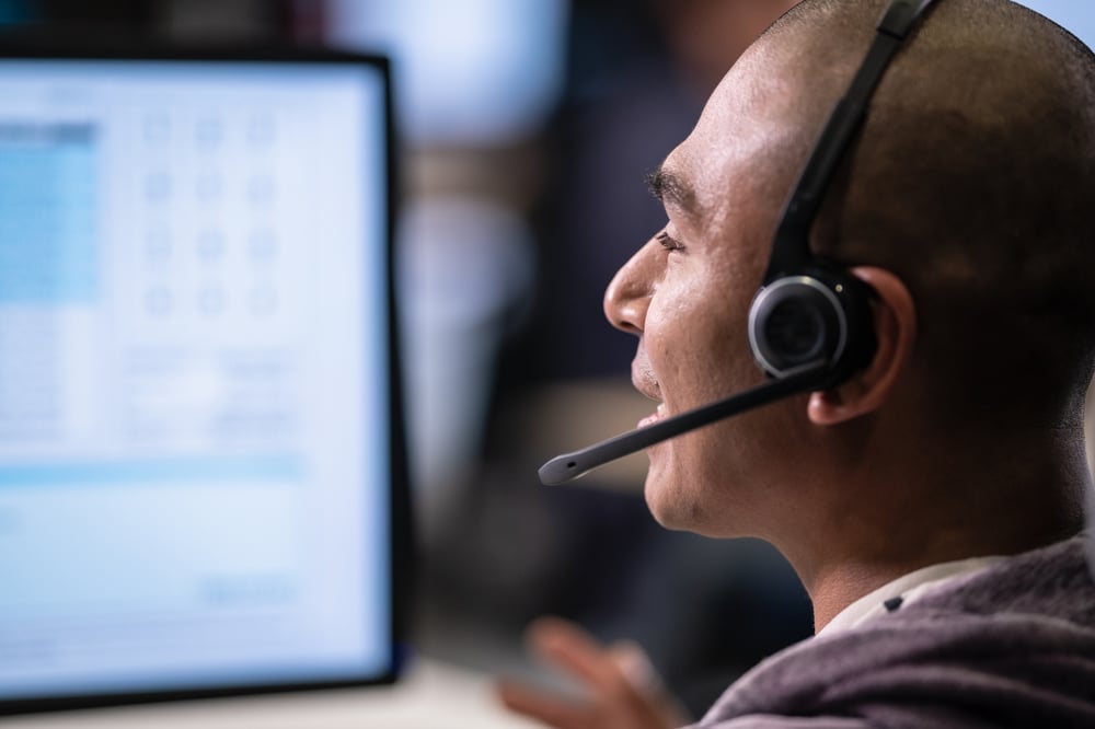 IT support technician helping customers